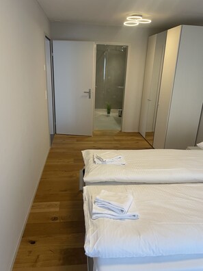 Apartamento superior | 2 quartos, Wi-Fi de cortesia, roupa de cama