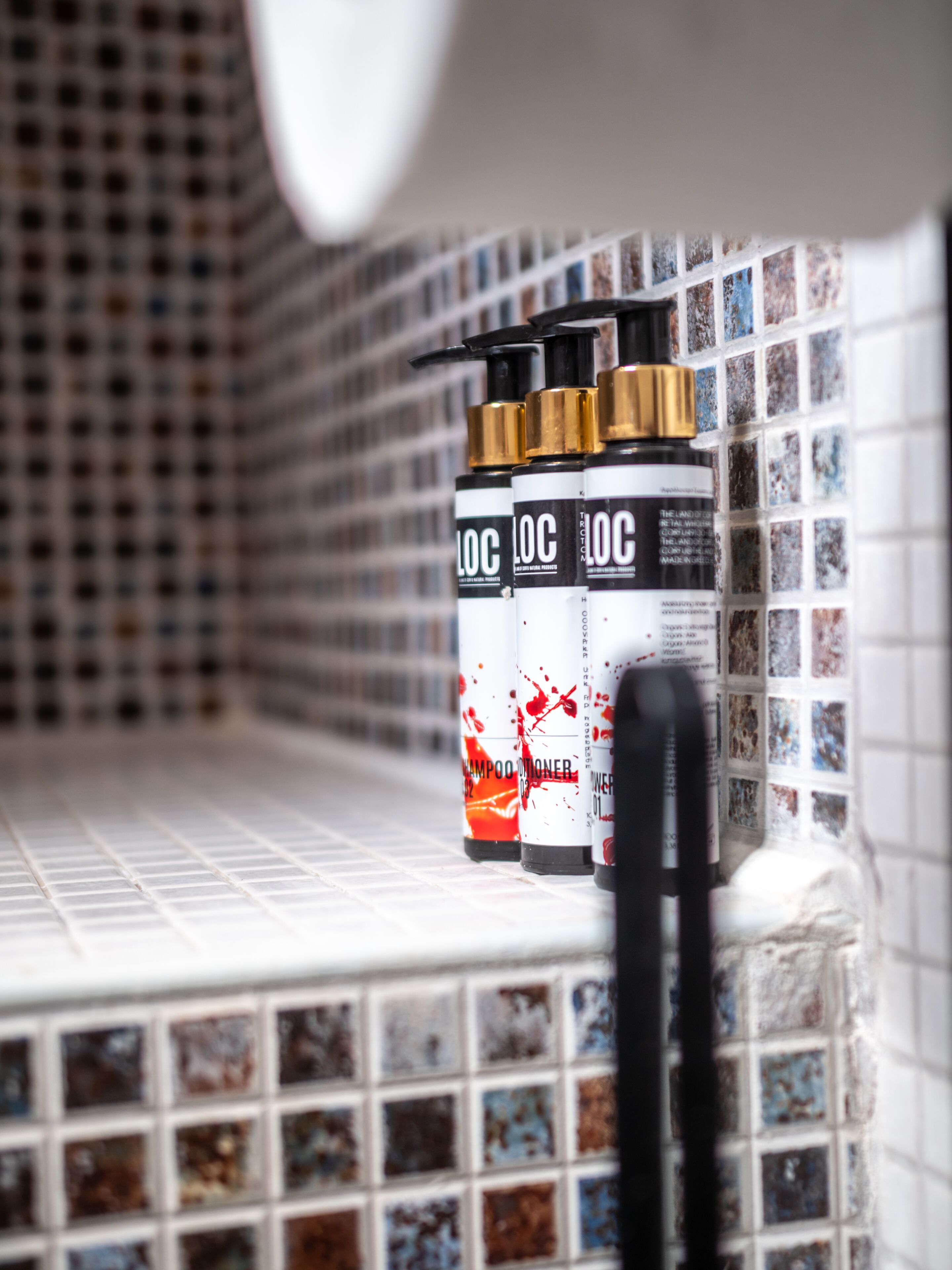 Shower, designer toiletries, hair dryer, towels