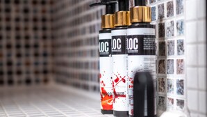 Three shampoo bottles labeled "LOC" on a tiled wall. - CAMPIELLO Apt. by LOC HOSPITALITY (Corfu)