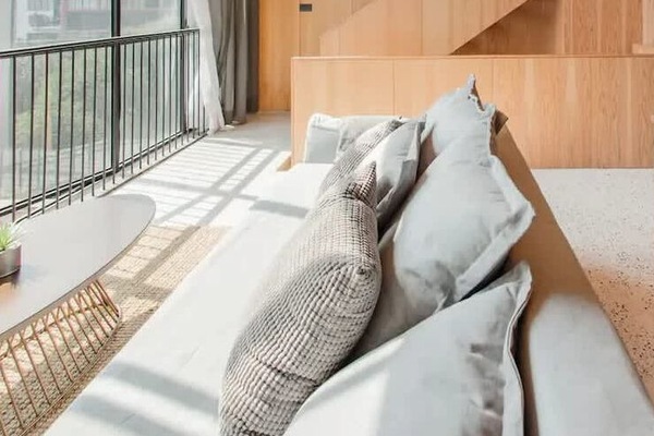 Floor-to-ceiling windows bring in natural light all day without needing to step outside for it.