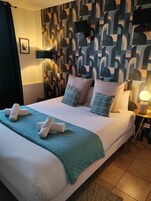 Quarto standard | Individualmente decorados, escrivaninha, Wi-Fi de cortesia