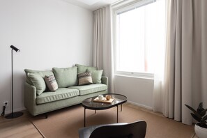 Desk, laptop workspace, blackout curtains, soundproofing