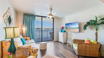 Comfort Condo, 2 Bedrooms, Balcony, Lagoon View | Living room | 55-inch Smart TV with cable channels