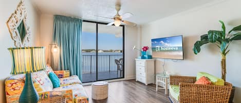 Comfort Condo, 2 Bedrooms, Balcony, Lagoon View | Living room | 55-inch Smart TV with cable channels