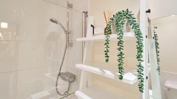Shower, hair dryer, shampoo