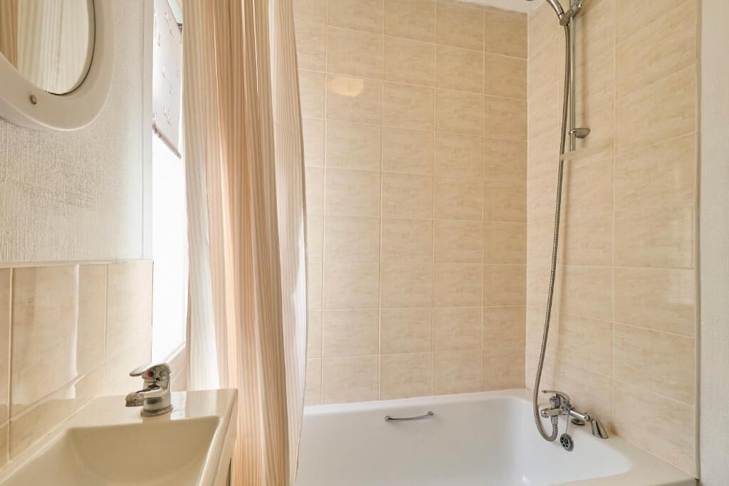 Shower, hair dryer, towels, shampoo
