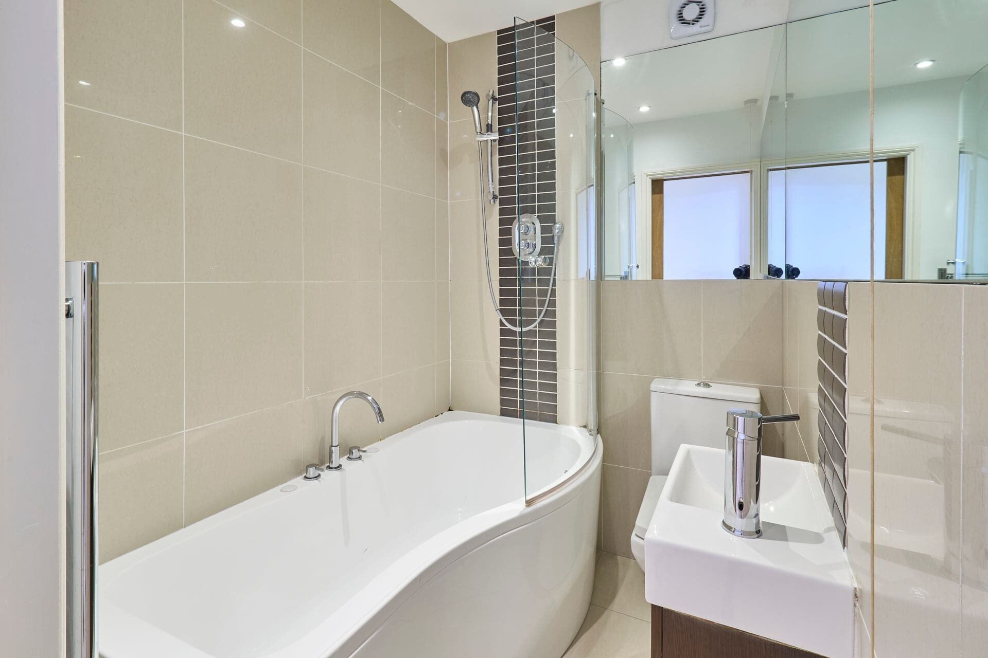 Shower, hair dryer, towels, shampoo