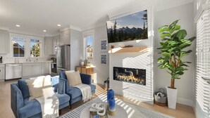 Un salon moderne avec un canapé bleu, une cheminée et une grande fenêtre donnant sur les montagnes.