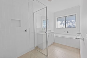 Shower, hair dryer, towels