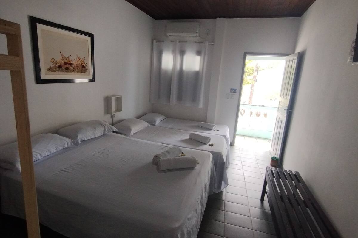 Comfort Quadruple Room, Beach View | 1 bedroom, laptop workspace, free WiFi, bed sheets