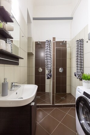 Hair dryer, towels, soap, shampoo