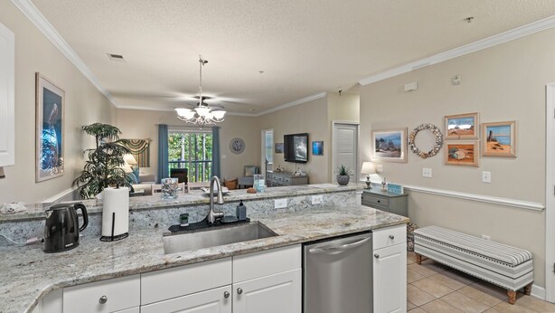 A kitchen with a granite countertop, stainless steel appliances, and a built-in dishwasher. - Willow Bend, Beautiful 2nd floor Villa  2Bedroom/2Bath, WiFi (North Myrtle Beach)