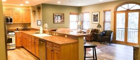 Condo, 2 Bedrooms | Private kitchen | Fridge, oven, coffee/tea maker