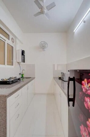 Fridge, microwave, electric kettle, toaster