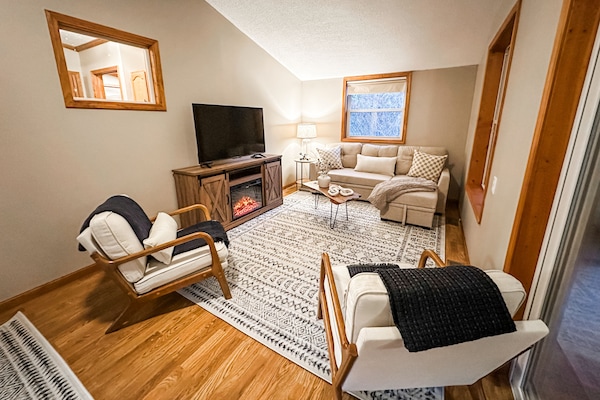 Secondary living room, located off of the kitchen next to the sun room.
