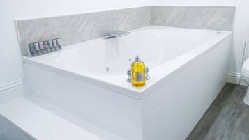 Shower, jetted bath, hair dryer, towels
