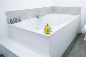 Shower, jetted bath, hair dryer, towels