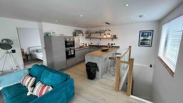 Ferienhaus | Wohnbereich | Fernseher