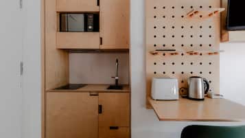 Mini-fridge, microwave, stovetop, electric kettle