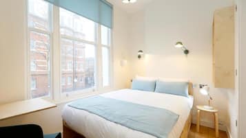 Premium bedding, down duvets, memory-foam beds, desk