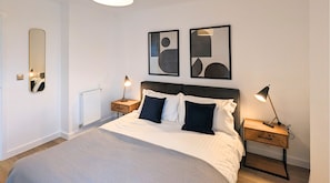 Desk, laptop workspace, free WiFi, bed sheets