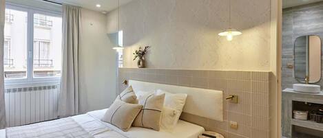 1 dormitorio, tabla de planchar con plancha, wifi gratis y ropa de cama