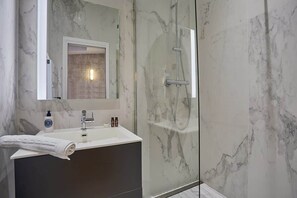 Shower, hair dryer, shampoo