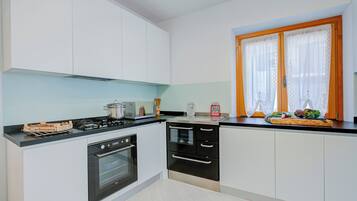 Family Apartment, 1 Bedroom, Mountainside (Casa dei Nonni) | Private kitchen | Fridge, microwave, oven, stovetop