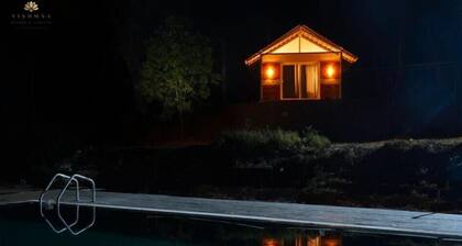 Nestled amidst the forested slopes of Coorg, Vishmaa Resorts & Camping.