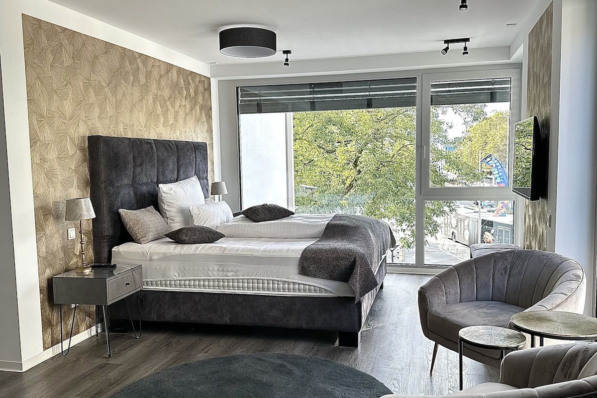 Deluxe-dobbeltværelse til 1 person | Opholdsområde | Tv