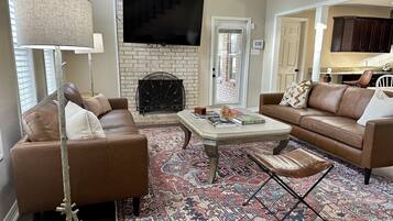 Smart TV, fireplace, books