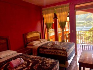 Basic Quadruple Room, 2 Double Beds, Ensuite, Garden View | Free WiFi, bed sheets - Hotel Adulam (San Pedro La Laguna)