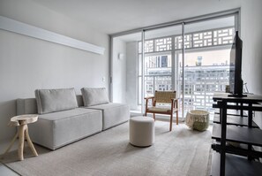 Deluxe Room | Living area | 42-inch Smart TV with digital channels, Netflix, streaming services