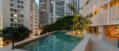 Outdoor pool, open 8:00 AM to 10:00 PM, pool umbrellas, pool loungers