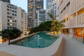 Outdoor pool, open 8:00 AM to 10:00 PM, pool umbrellas, pool loungers