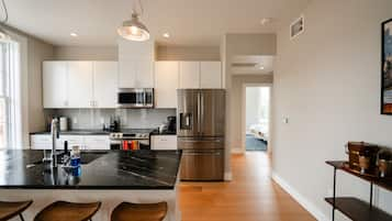 Coupe - 2/1.5 with Main St View | Private kitchen | Full-size fridge, microwave, oven, stovetop