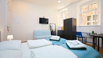 1 dormitori, planxa i posts de planxar, wifi gratuïta i roba de llit