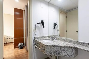 Hair dryer, towels, soap, shampoo