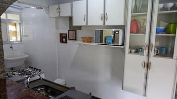 Superior Apartment, Multiple Beds | Private kitchen
