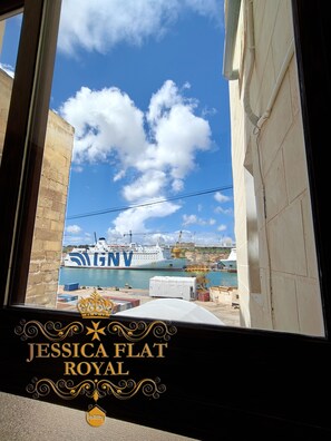 Family Quadruple Room, Harbor View | Desk, laptop workspace, soundproofing, free WiFi