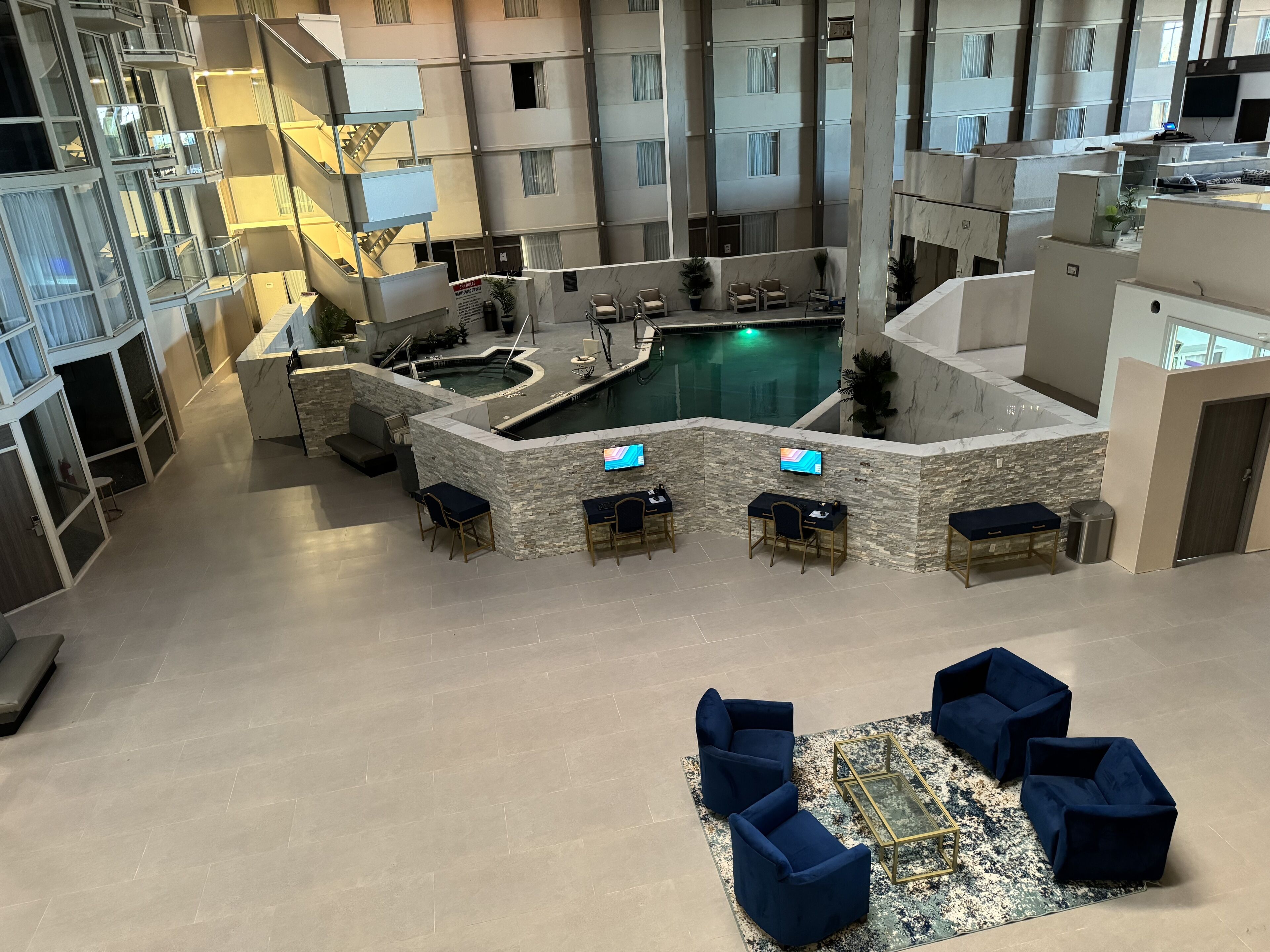 Indoor pool, outdoor pool, open 9:00 AM to 9:00 PM, pool umbrellas