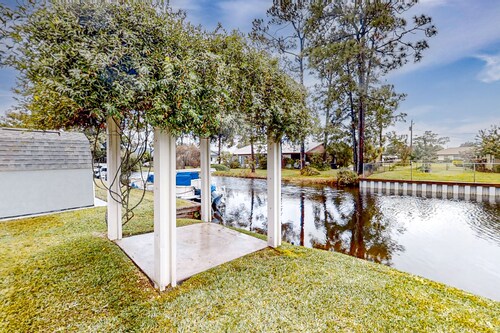 Dog-friendly canal-front home near Lake Jackson with water views, grill, firepit