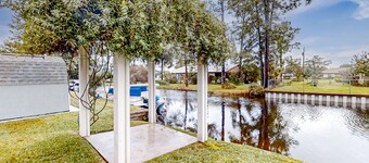 Dog-friendly canal-front home near Lake Jackson with water views, grill, firepit