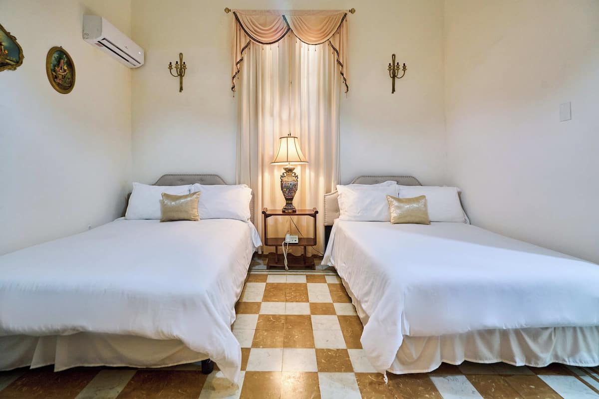 Family Room | Egyptian cotton sheets, premium bedding, down duvets, memory-foam beds