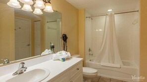 Hair dryer, towels, soap, shampoo