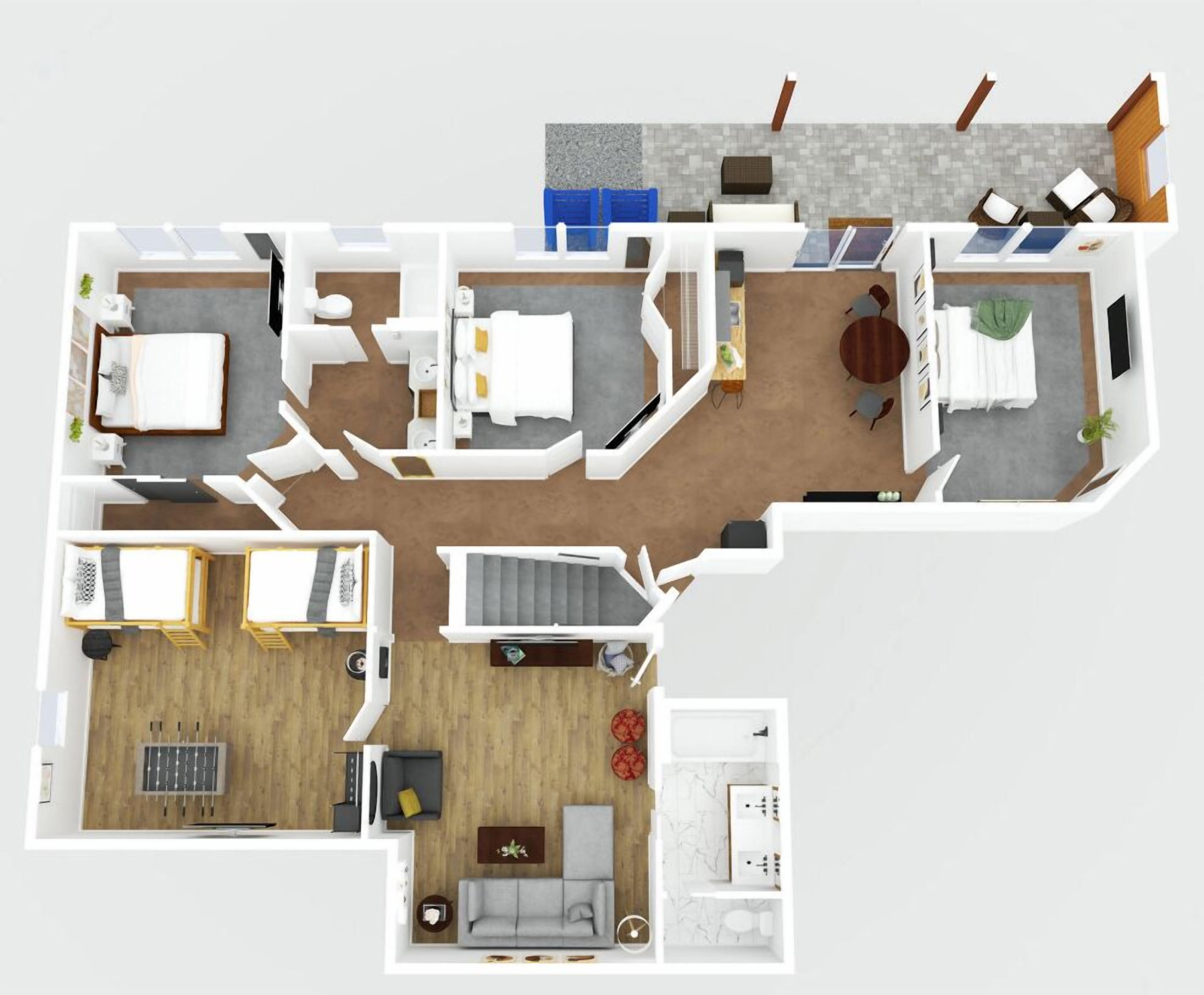 Un plan d’étage en 3D d’un appartement moderne comprenant un salon, une cuisine, un coin repas, deux chambres et une salle de bain.