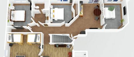 Un plan d’étage en 3D d’un appartement moderne comprenant un salon, une cuisine, un coin repas, deux chambres et une salle de bain.