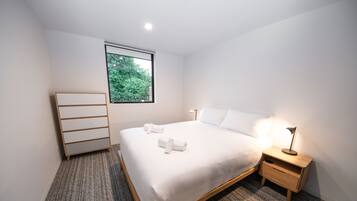 Luxury Apartment, 1 Bedroom, Garden View | 1 bedroom, blackout drapes, soundproofing, iron/ironing board