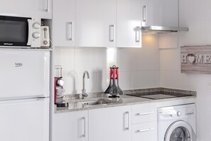 Fridge, microwave, stovetop, coffee/tea maker - Apartment 'Cala En Forcat' with Shared Pool, Private Terrace and Wi-Fi (Menorca)