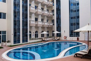 Outdoor pool - Lovely Studio Apartment in JVC. Budget friendly (Dubai)